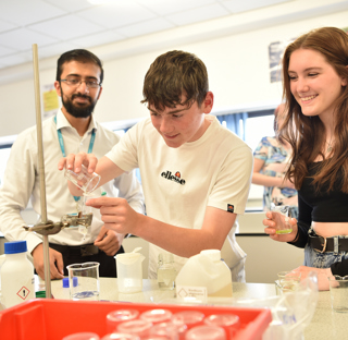 Open Event Visitors conducting Science experiment