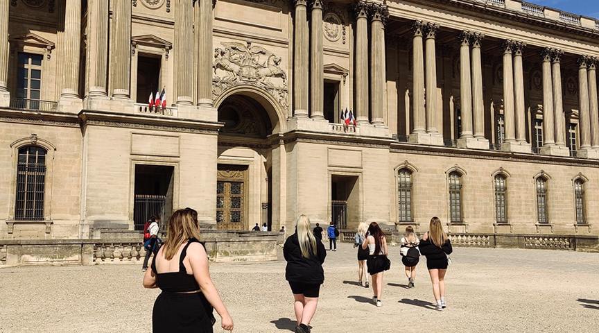 students walking towards Paris museum