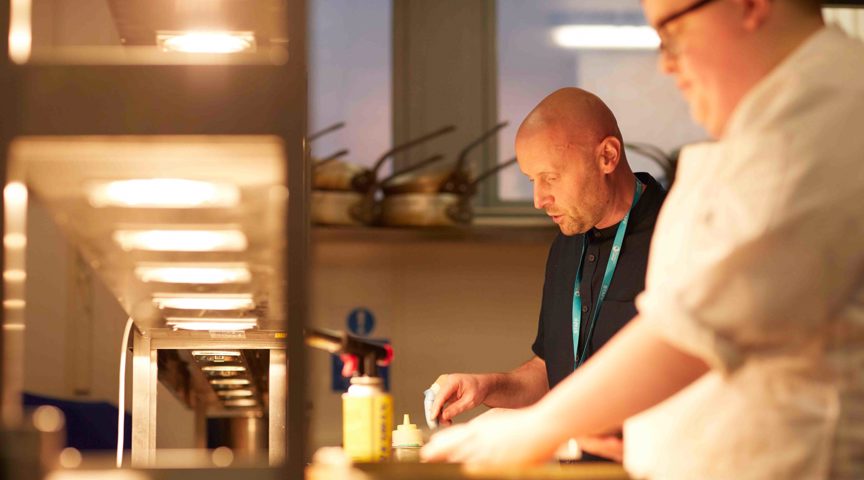 Two chef cooking in the kitchen