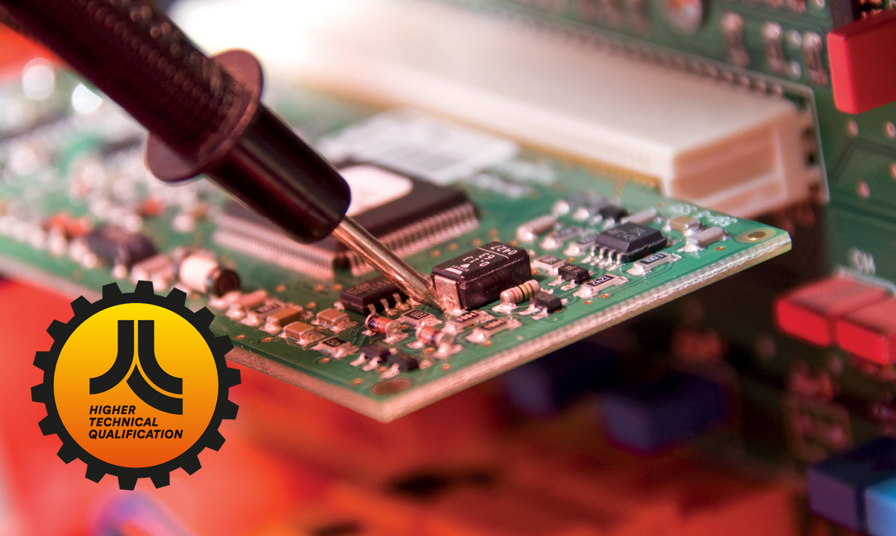 close up of tool on electrical circuit board