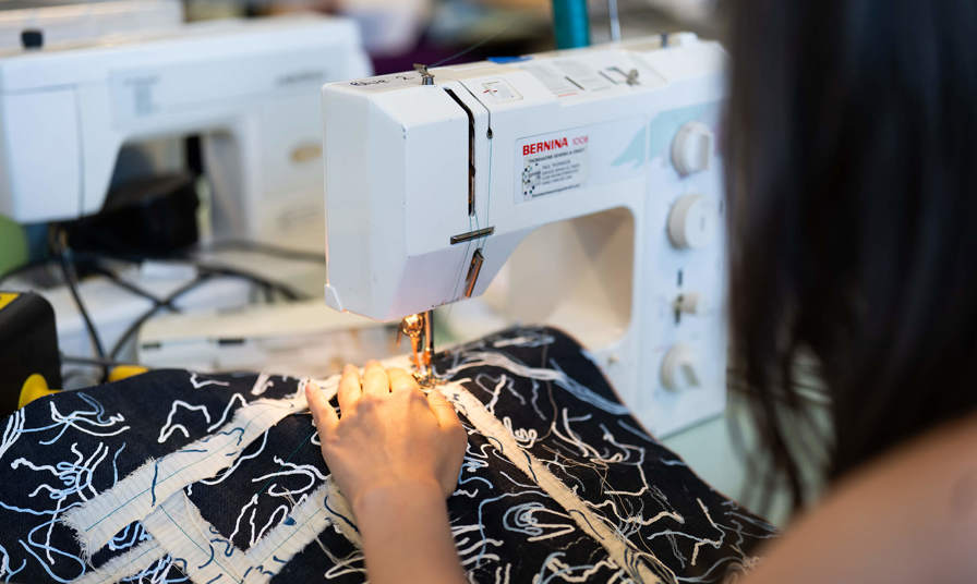 Photo of a sewing machine in use 