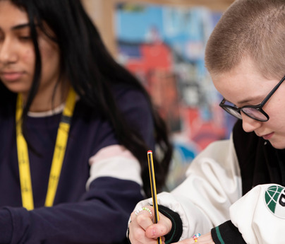 students in class one focused on work with pencil